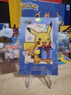 Pokemon Merry Christmas Card Database - Pikachu Christmas Holding Blue Present - Image 1