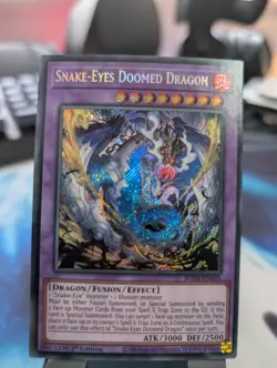YuGiOh! Snake-Eyes Doomed Dragon SUDA-EN035 Secret Rare 1st Ed - Image 1