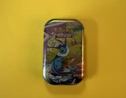 Pokemon TCG: Scarlet & Violet - Prismatic Evolutions Mini Tin Vaporeon - SEALED - Image 1