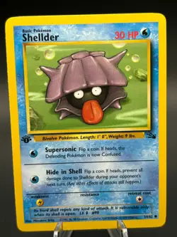 1st Edition Shellder LP/NM 54/62 Fossil Common Pokemon Card - Image 1