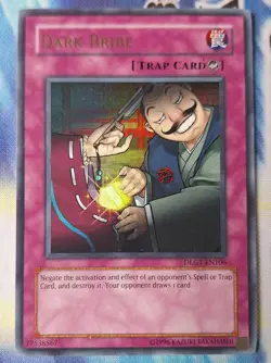 Yugioh Dark Bribe - Ultra Rare - Near Mint - Unlimited DLG1-EN106 - Image 1