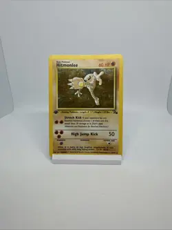 1st Edition Hitmonlee 7/62 Fossil 1999 Holo Rare WOTC Pokemon Card TCG - Image 1