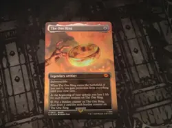 The One Ring NM Borderless Foil Promo Magic the Gathering - Image 1