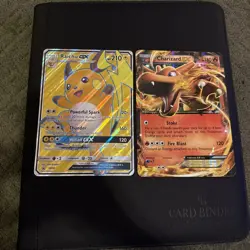 Full Pokemon Binder Collection With Charizard Figure And Card Sleeves - Image 1