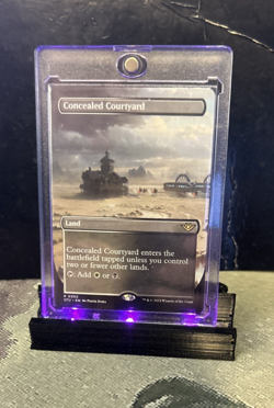 MTG Concealed Courtyard (Borderless) - Outlaws of Thunder Junction (OTJ) #302 - Image 1