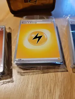 Pokemon TCG Tin With 3 Unopened Packs Of Energy Cards - Image 3