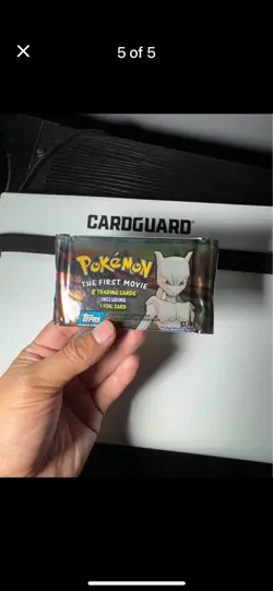 One Pk 1999 Pokemon The First Movie Booster Black Topps - Image 1