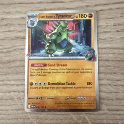 Team Rocket’s Tyranitar Pokemon Center Stamp Promo Destined Rival 096/182 - Image 1