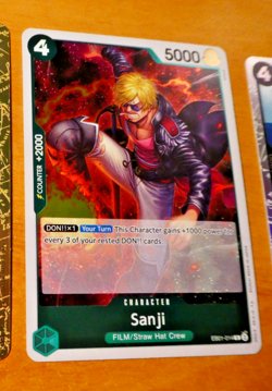 ONE PIECE ENGLISH CARD RARE HOLO GAME CARTE SANJI EB01-014 EN JCC MINT - Image 1