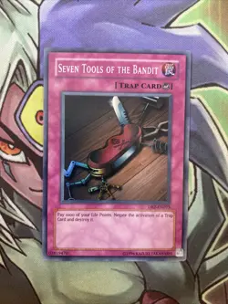 DB2-EN075 Seven Tools Of The Bandit Super Rare Unlimited Edition NM Yugioh Card - Image 1
