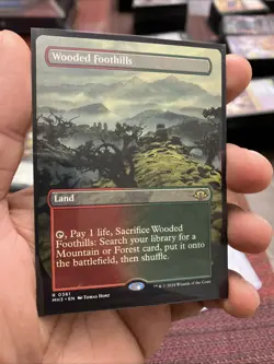 Wooded Foothills (Borderless) Modern Horizons 3 Regular - Image 1