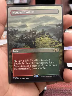 Wooded Foothills (Borderless) Modern Horizons 3 Regular - Image 1