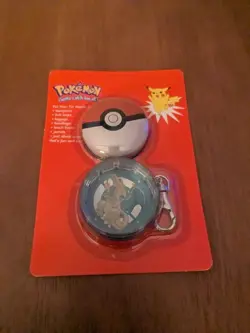 CHARIZARD Factory Sealed UNPUNCHED!!! 1999 Vintage Pokemon Tin Dangle Keychain - Image 1