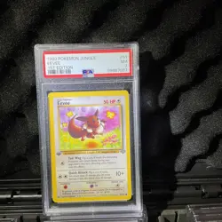 1999 POKEMON JUNGLE 1ST EDITION #51 EEVEE PSA 7 - Image 1