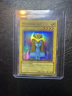 🔥 YuGiOh Mystical Elf LOB-EN062 LEGEND OF BLUE-EYES SET SUPER RARE NEAR MINT - Image 1