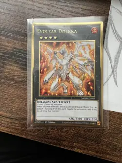 Yugioh Evolzar Dolkka Gold Rare MGED-EN029 1st Ed Near Mint - Image 1