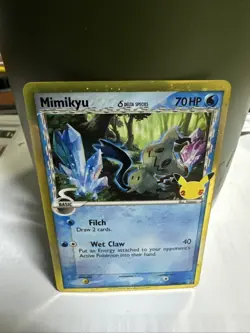 Pokemon Mimikyu SWSH136 Delta Holo 25th Celebrations Collection BMWT - Image 1