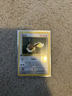 1st Edition Eevee 55/82 Team Rocket 2000 Pokemon Card - Image 1
