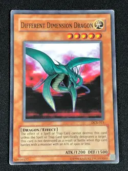 YUGIOH DIFFERENT DIMENSION DRAGON DCR-015 SUPER PLAY/EDGE WEAR - Image 1
