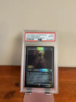 2024 MTG FALLOUT SERIALIZED BOBBLEHEAD #1063 LUCK BOBBLEHEAD 230/500 PSA 8 - Image 1