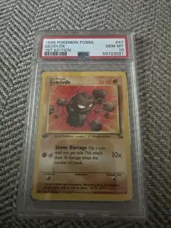 1999 PSA 10 Pokemon First Edition Fossil Geodude 47/62 - Image 1