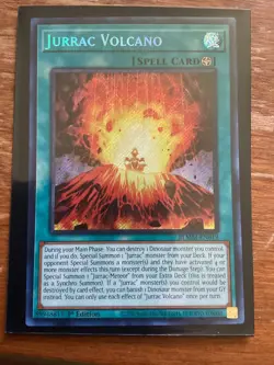 Jurrac Volcano- Yu-Gi-Oh! - BLMM-EN019 - (Near Mint Condition) - Image 1