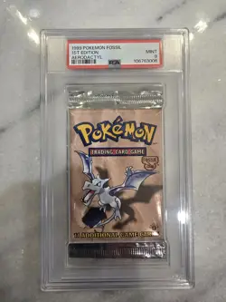 1999 POKEMON FOSSIL 1ST EDITION AERODACTYL ART SEALED BOOSTER PACK PSA 9 - Image 1