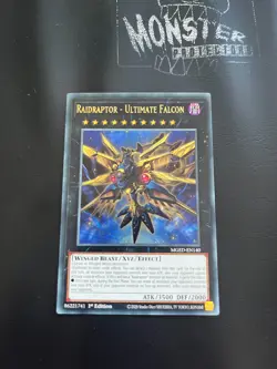 YUGIOH RAIDRAPTOR - ULTIMATE FALCON GOLD LETTER RARE MGED-EN140 1ST EDITION - Image 1