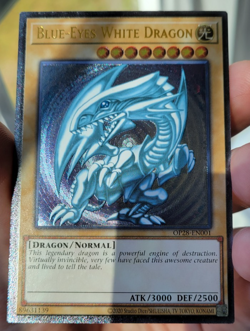 Yu-Gi-Oh! Blue-Eyes White Dragon OP28-EN001 Ultimate Rare MISPRINT VLP - Image 1