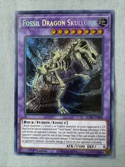 Fossil Dragon Skullgios BLAR-EN009 Secret Rare 1st Edition NM/M YuGiOh Card - Image 1