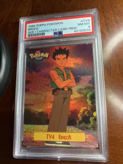 1999 Topps Pokemon #TV4 Brock Rainbow Foil Black Dots & Rectangles PSA 8 NM-MT - Image 1