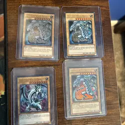 Set of 4 BLUE-EYES WHITE DRAGONS Yu-gi-oh Super Rare to Ultra Rare - Image 1