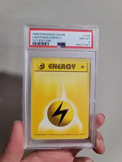 1999 Pokemon Game #100 Lightning Energy 1st Edition PSA 8 NM-MT Base Set - Image 1