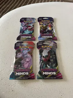 Pokemon Sun & Moon Unified Minds Sleeved Booster Packs Complete Art Set of 4 - Image 1