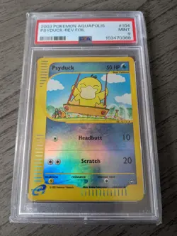 Pokemon PSA 9 Mint Aquapolis Psyduck Reverse Holo 104/147 Keiko Fukuyama Artwork - Image 1