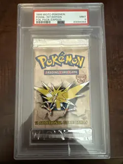 1999 POKEMON 1ST EDITION FOSSIL BOOSTER PACK ZAPDOS ART PSA 9 - Image 1