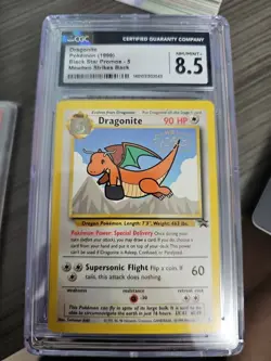 1999 POKEMON GAME MOVIE PROMO #5 DRAGONITE CGC 8.5 - Image 1