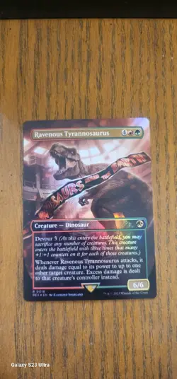 MTG Ravenous Tyrannosaurus Borderless Foil 0018 Lost Caverns - Image 1