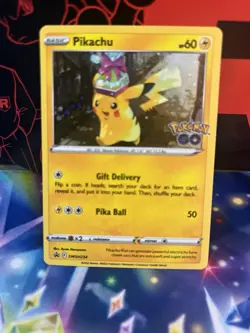 Pikachu SWSH234 LP 2022 Cosmos Holo Black Star Promo Pokemon GO Card - Image 1