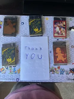 Pokemon mystery Pack.21 cards and 2 TCG packs. 1 v or better 3 holos an 15 basc￼ - Image 3