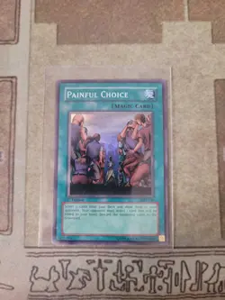 YUGIOH PAINFUL CHOICE MRL-049 SUPER 1ST ED NM 1996 - Image 1