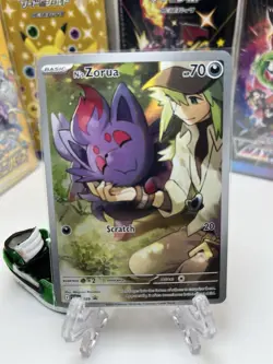 Pokemon TCG N's Zorua SVP 189, Journey Together, Black Star Promo Card - Image 1