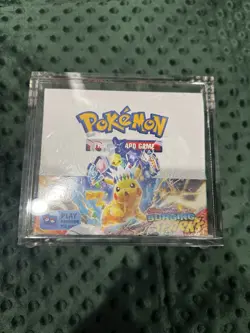 Pokemon TCG: Surging Sparks Factory Sealed Booster Box W/Acrylic Case - Image 1