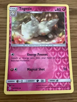 Togetic Pokemon Card 137/214 Reverse Holo- Used - Sun and Moon - Unbroken Bonds - Image 1