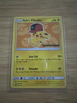 Ash’s Pikachu SM110 Ultra Rare Non Holo Exclusive Promo Pokemon Card - Image 1