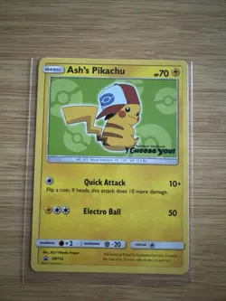 Ash’s Pikachu SM112 Ultra Rare Non Holo Exclusive Promo Pokemon Card - Image 1