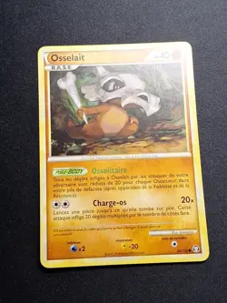 NEUVE SORTIE DE BOOSTER Osselait 60/102 HGSS Triomphe Carte Pokemon FR - Image 1